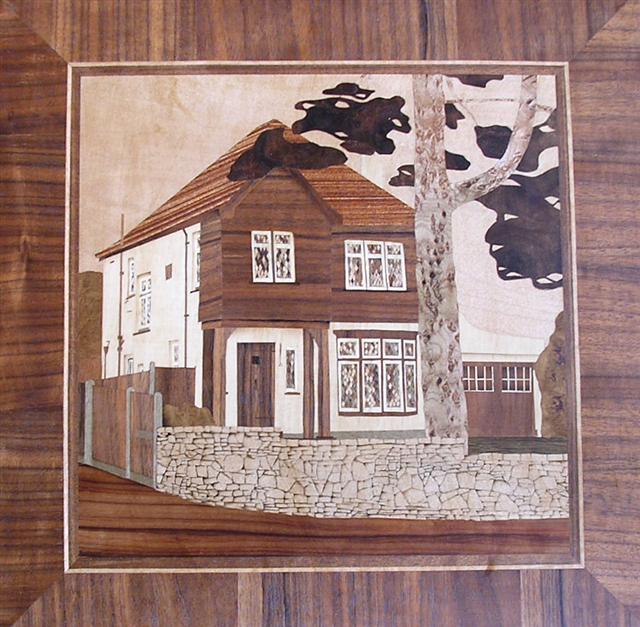 Marquetry picture of house