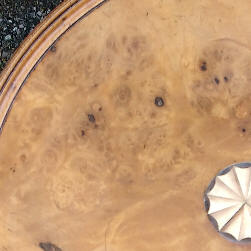 Restored table with marquetry logo